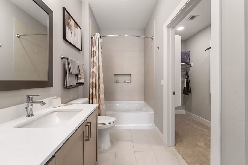 Elegant bathroom with modern fixtures at Maxwell on 66th Apartments