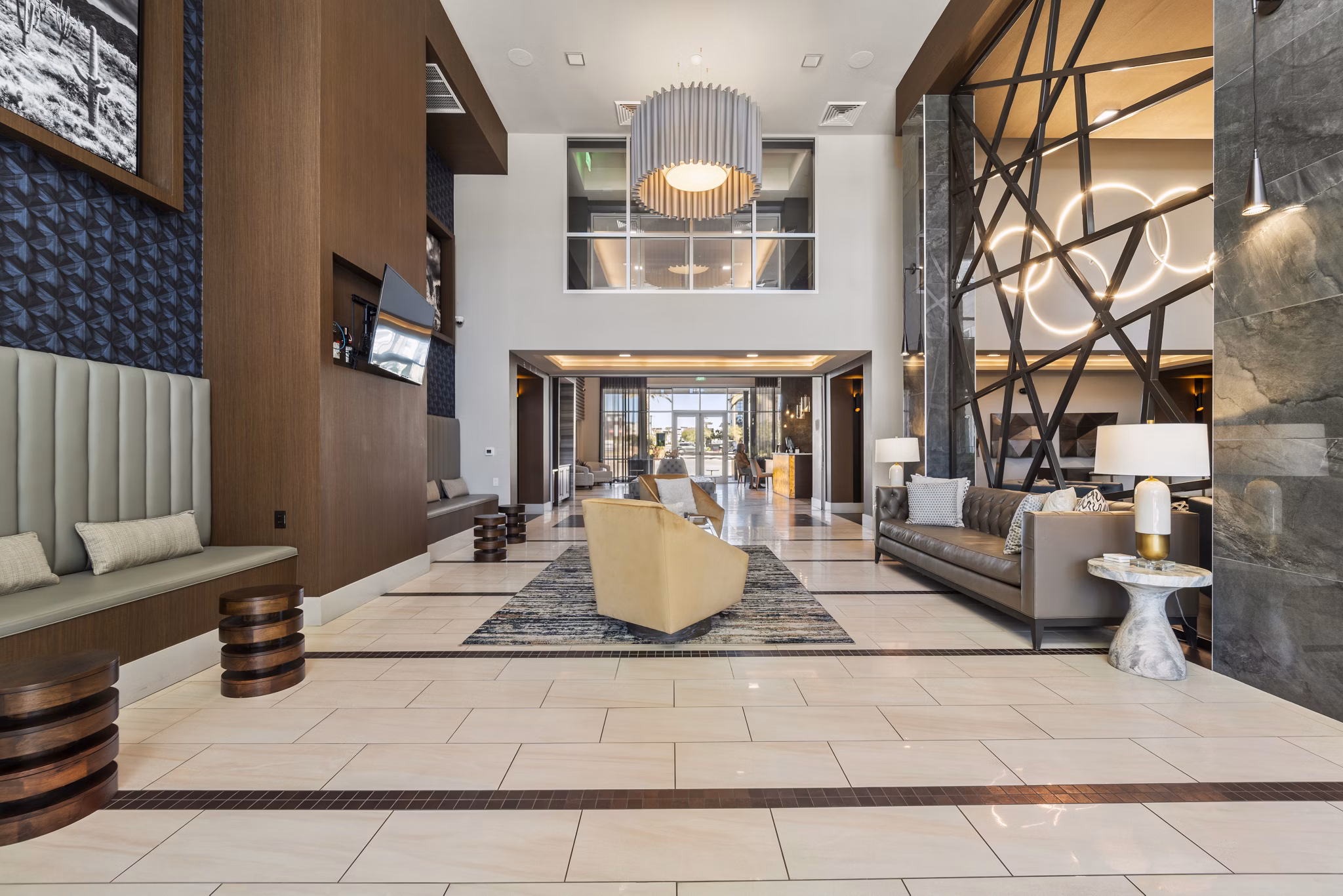 Maxwell on 66th Apartments: Contemporary clubhouse with modern furnishings and open space in luxury Greystar property