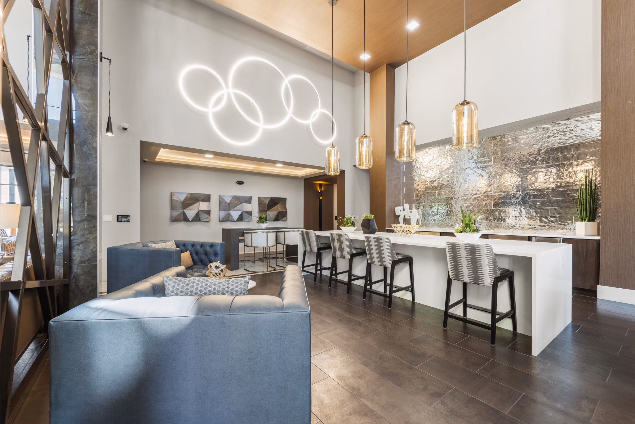 Contemporary clubhouse with stylish seating and communal spaces at Maxwell on 66th Apartments