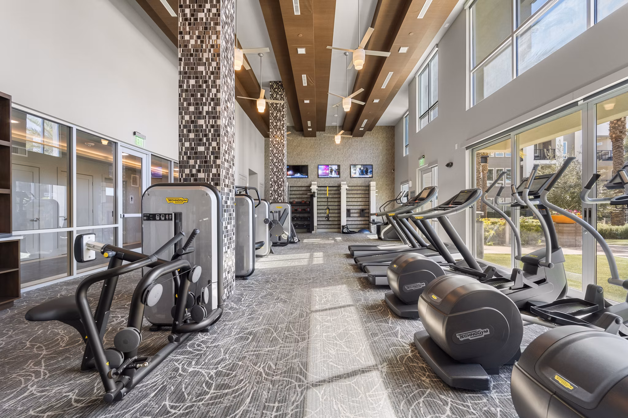 State-of-the-art fitness center featuring modern equipment at Maxwell on 66th Apartments, perfect for a healthy lifestyle