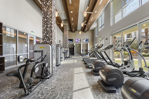 State-of-the-art fitness center featuring modern equipment at Maxwell on 66th Apartments, perfect for a healthy lifestyle