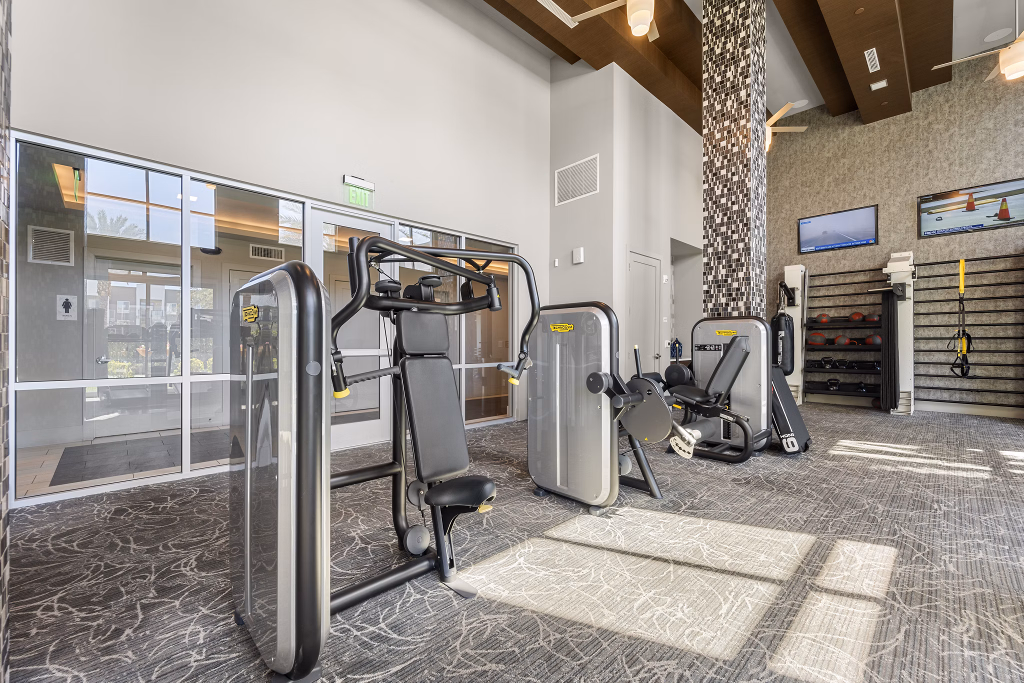 State-of-the-art fitness center with modern equipment at Maxwell on 66th Apartments
