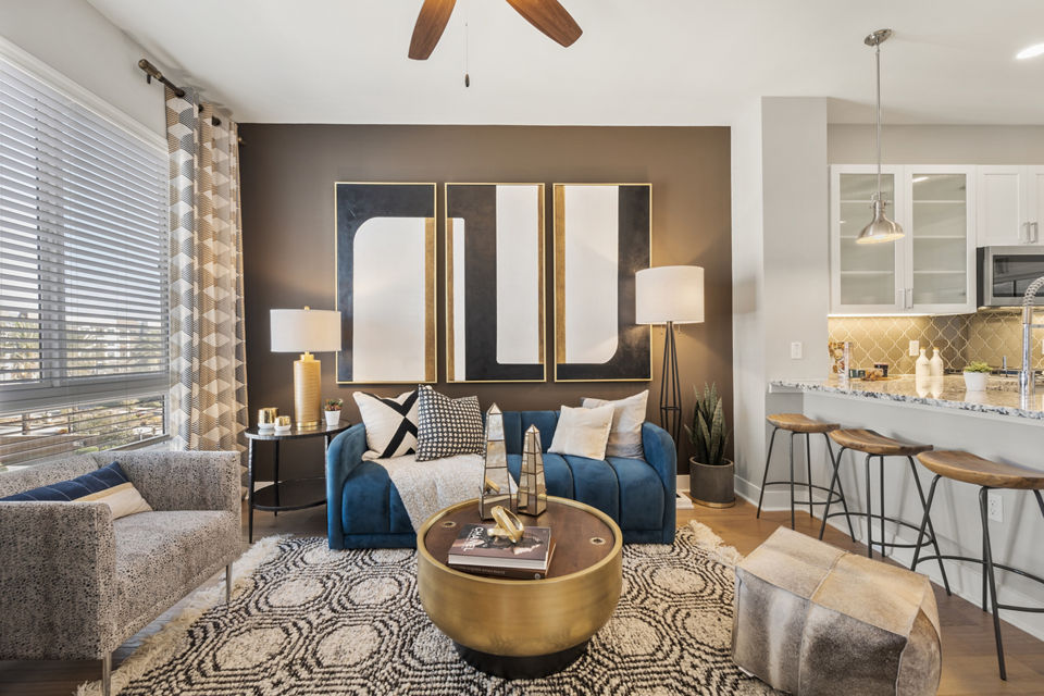 Spacious living room with modern decor in Maxwell on 66th Apartments