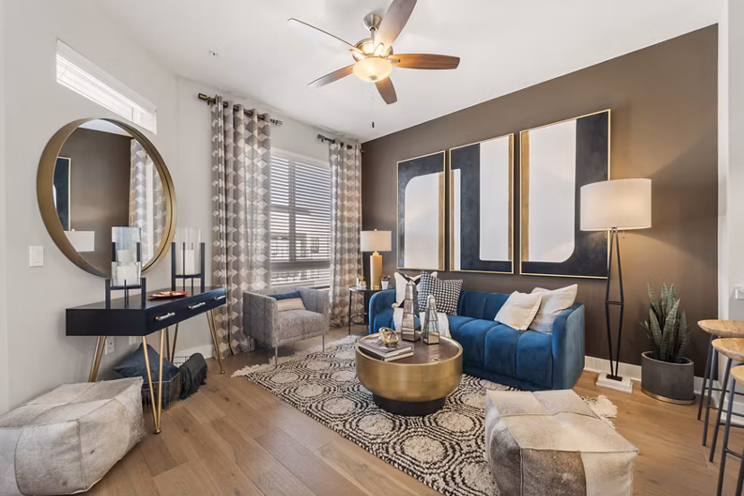 Maxwell on 66th Apartments: Stylish living room with modern furniture and ample natural light
