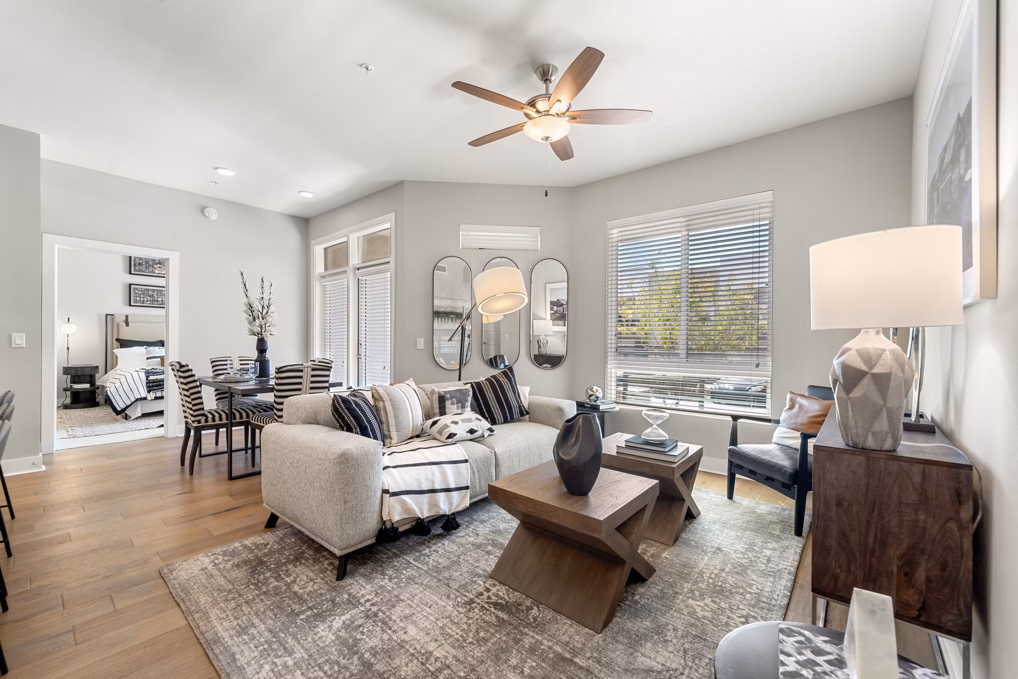 Spacious living room with modern dÃ©cor at Maxwell on 66th Apartments, offering a luxury lifestyle