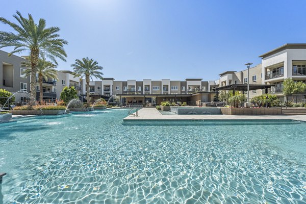 Infinity pool with loungers at Maxwell on 66th Apartments