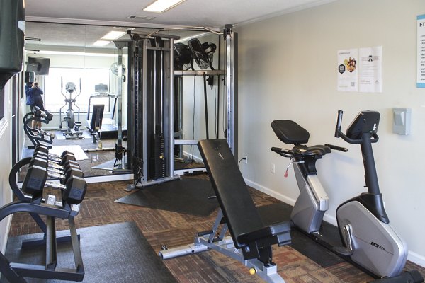 Full-service fitness center with modern equipment at 3 Corners East Apartments