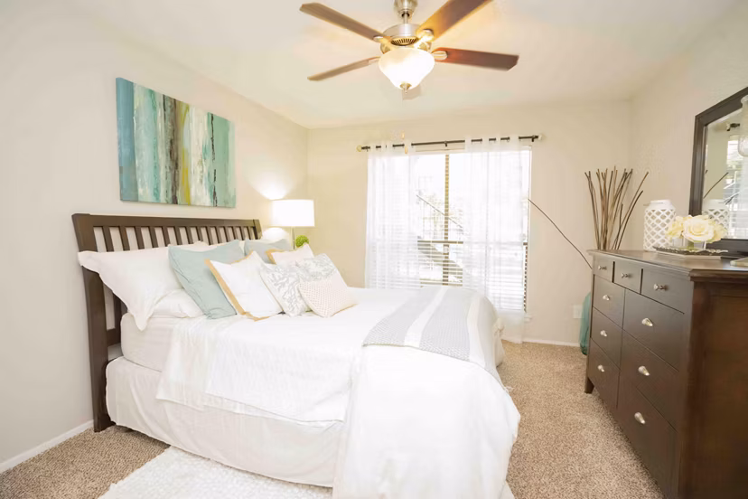 Modern bedroom with natural light at 3 Corners North Apartments