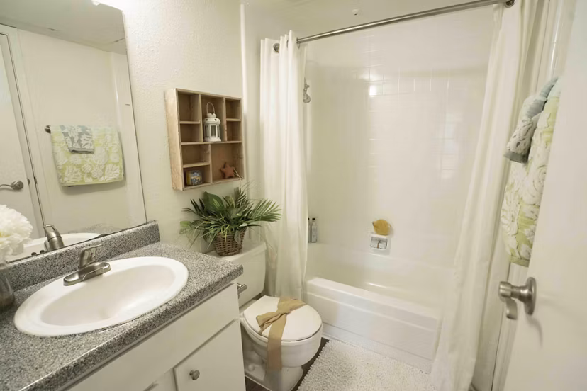 Bathroom featuring sleek fixtures and modern design in 3 Corners North Apartments