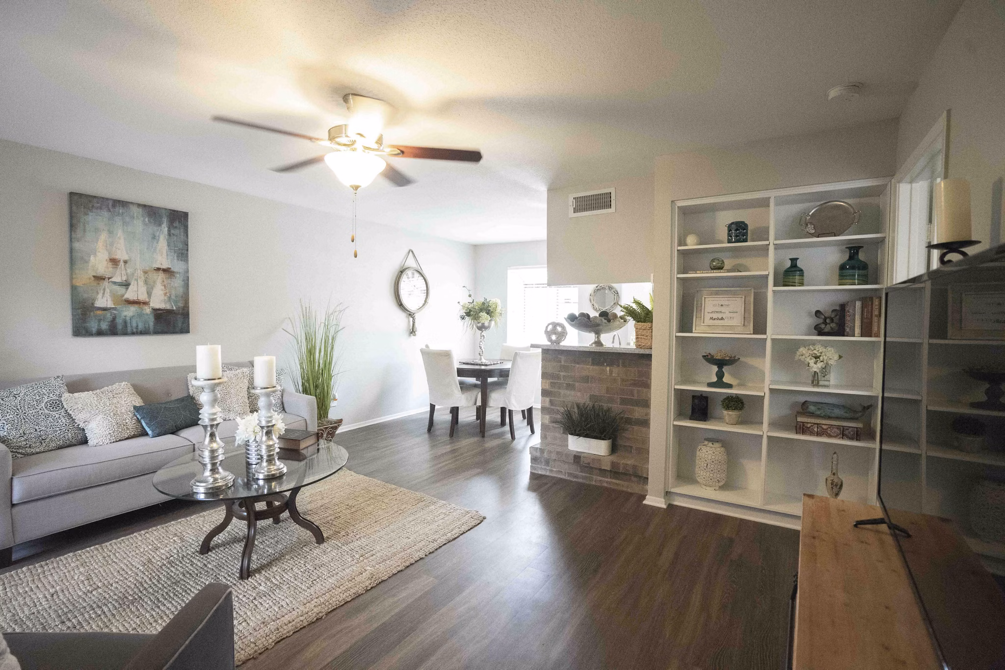 Spacious modern living room with stylish furniture in 3 Corners North Apartments
