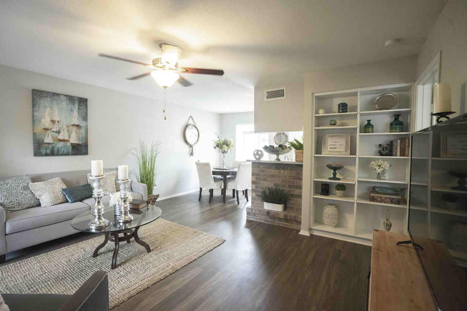 Spacious modern living room with stylish furniture in 3 Corners North Apartments