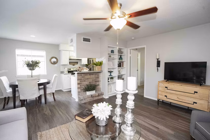 Spacious living room with modern decor in 3 Corners North Apartments luxury housing
