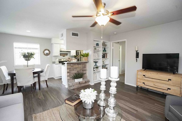 Spacious living room with modern decor in 3 Corners North Apartments luxury housing