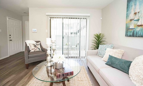 Spacious living room with modern decor in 3 Corners North Apartments offering comfortable luxury living spaces