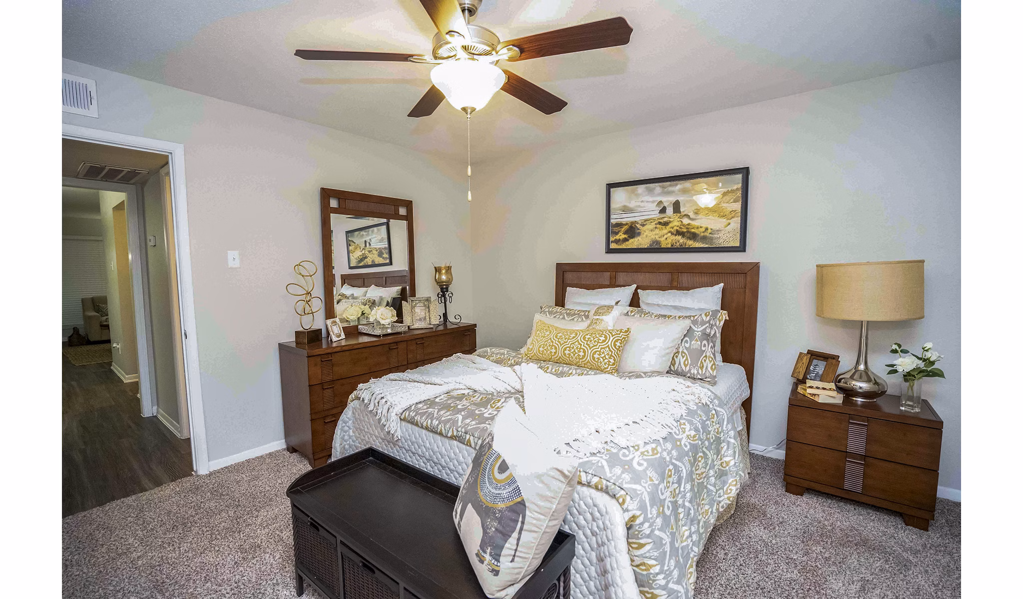 Cozy bedroom with stylish furnishings at 3 Corners West Apartments