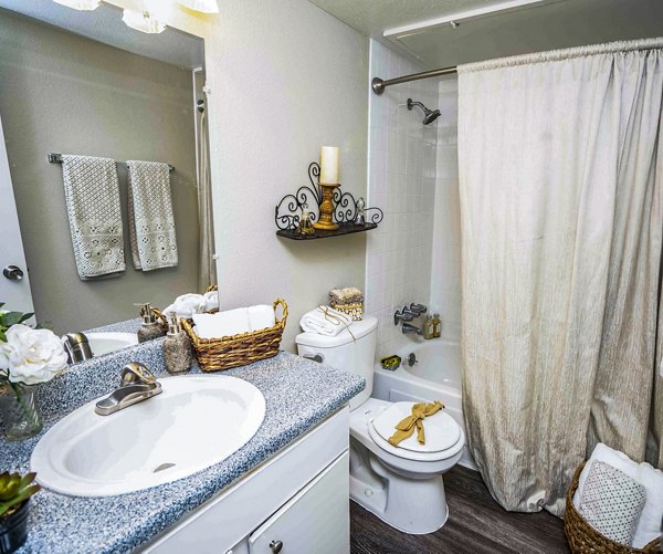 Modern bathroom with sleek fixtures at 3 Corners West Apartments, showcasing luxurious design and functionality