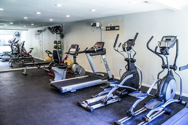 State-of-the-art fitness center at 3 Corners West Apartments, featuring modern equipment and spacious workout areas