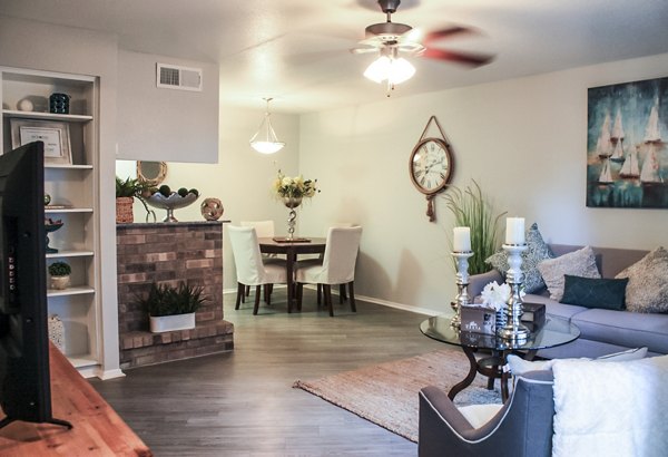 Spacious living room with modern decor at 3 Corners West Apartments