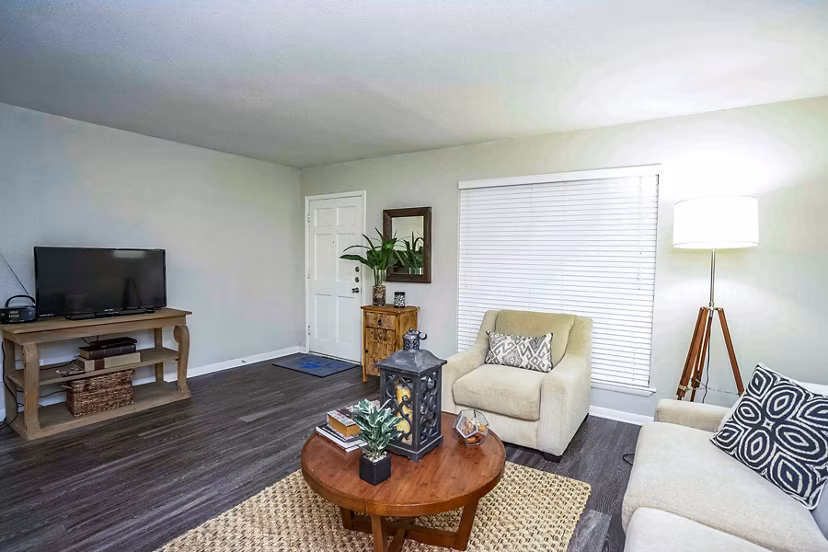 Living room with contemporary furniture at 3 Corners West Apartments