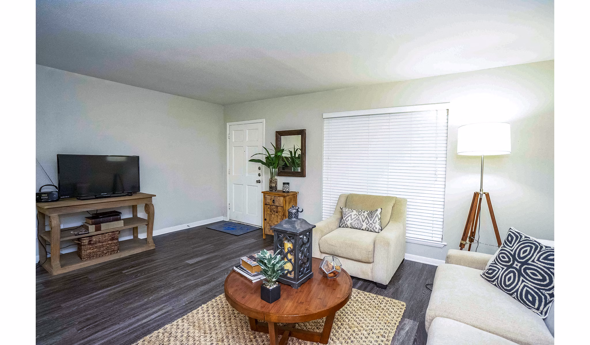 Living room with contemporary furniture at 3 Corners West Apartments