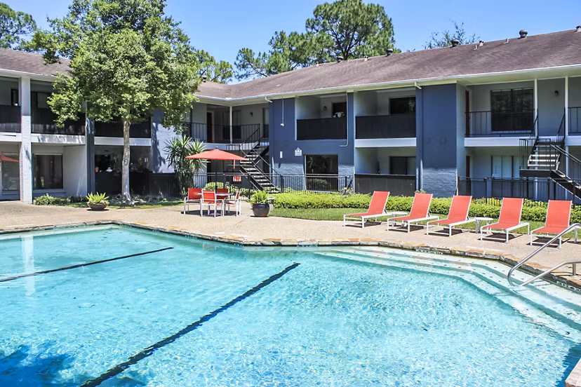 Luxurious poolside view at 3 Corners West Apartments offering relaxation and leisure amenities