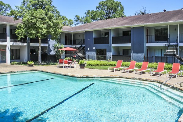 Luxurious poolside view at 3 Corners West Apartments offering relaxation and leisure amenities