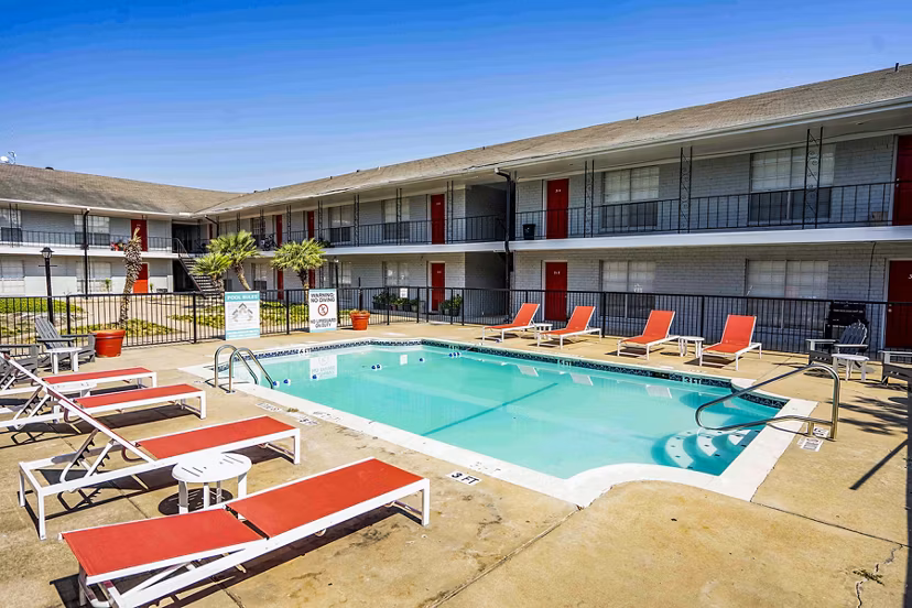 Luxury pool with modern sun loungers at 3 Corners West Apartments, perfect for relaxation and leisure