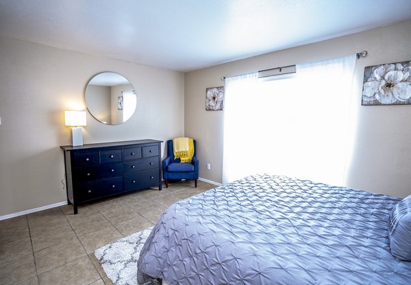 Modern bedroom with stylish dÃ©cor at Hammerly Oaks Apartments
