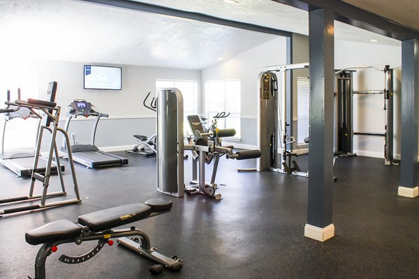 State-of-the-art fitness center featuring modern equipment at Hammerly Oaks Apartments, ideal for residents seeking an active lifestyle