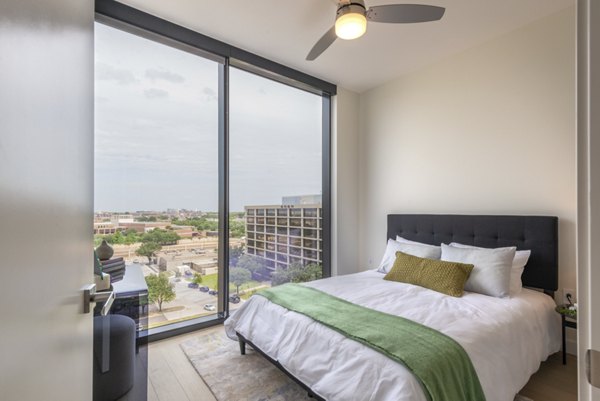 Spacious bedroom with modern furnishings in Eastline Residences Apartments, offering luxury living in a prime location
