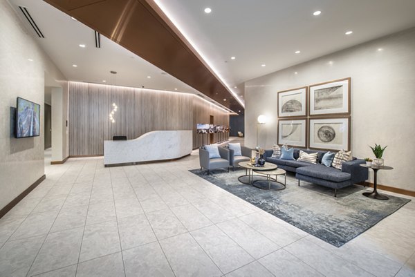 Stylish clubhouse with modern furnishings at Eastline Residences Apartments, ideal for social gatherings and leisure activities