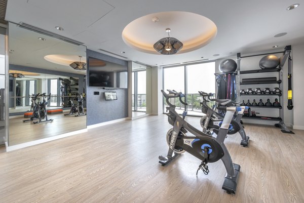 Modern yoga/spin studio with state-of-the-art equipment at Eastline Residences Apartments, ideal for active urban lifestyles