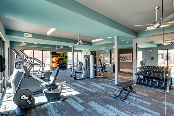 fitness center at Scenic at River East Apartments