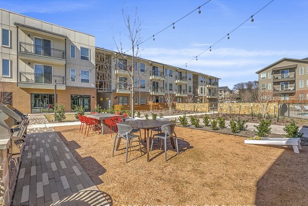 clubhouse/sport court at Scenic at River East Apartments