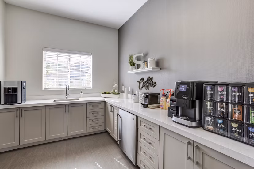 Modern kitchen with stainless steel appliances at The Sterling Apartments, offering luxury living spaces in an upscale community