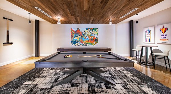 clubhouse game room at Judson Mill Lofts Apartments