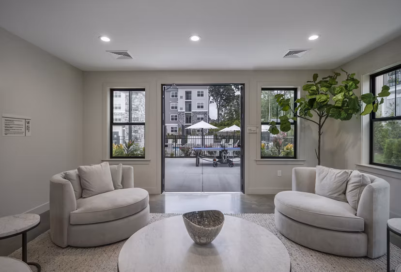 Elegant clubhouse with modern dÃ©cor at Woodside Trumbull Apartments