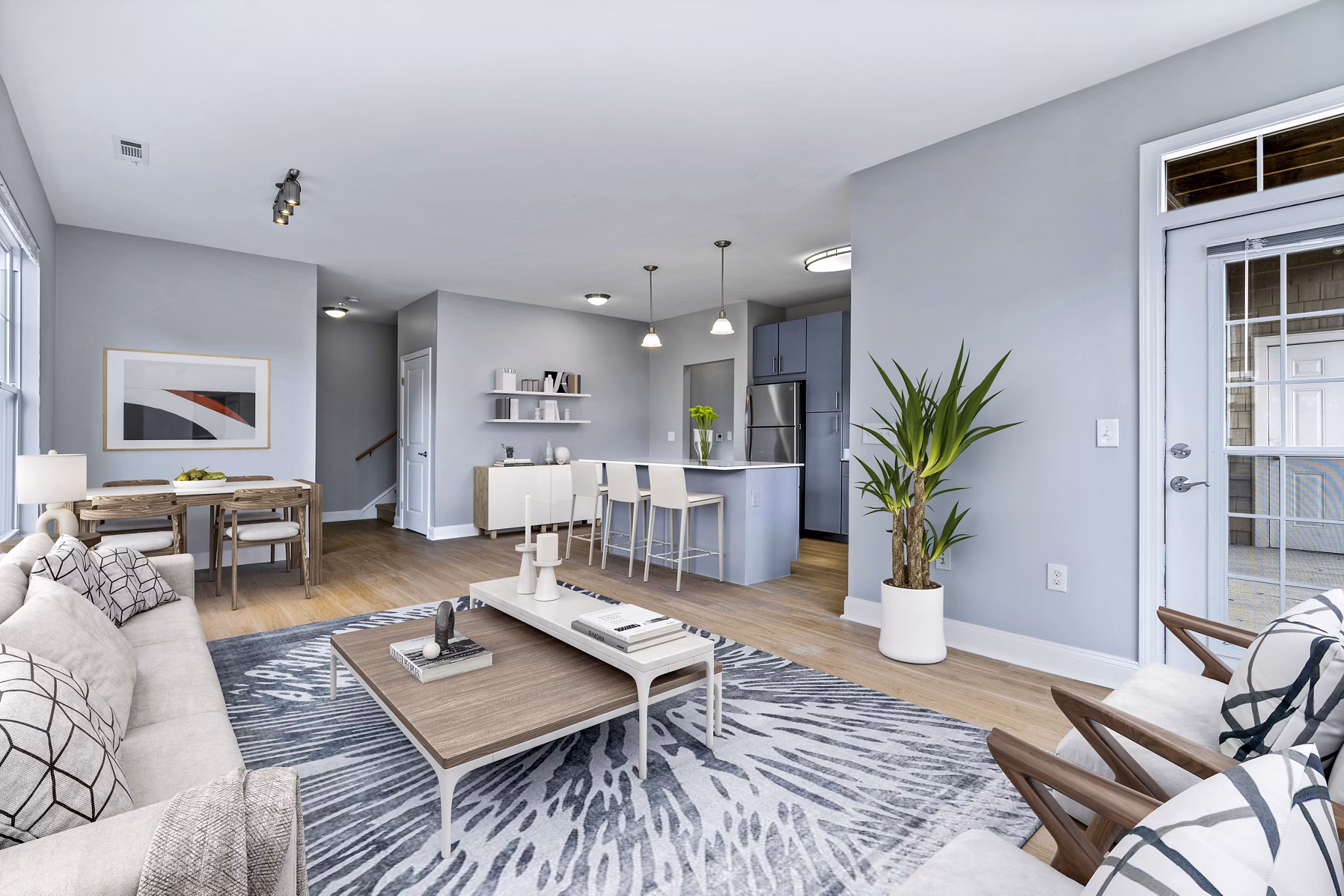 Spacious living room with modern decor at The Preserve at Cohasset Apartments