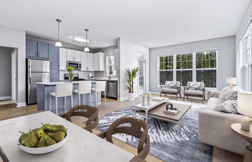 Dining area with elegant chandelier at The Preserve at Cohasset Apartments