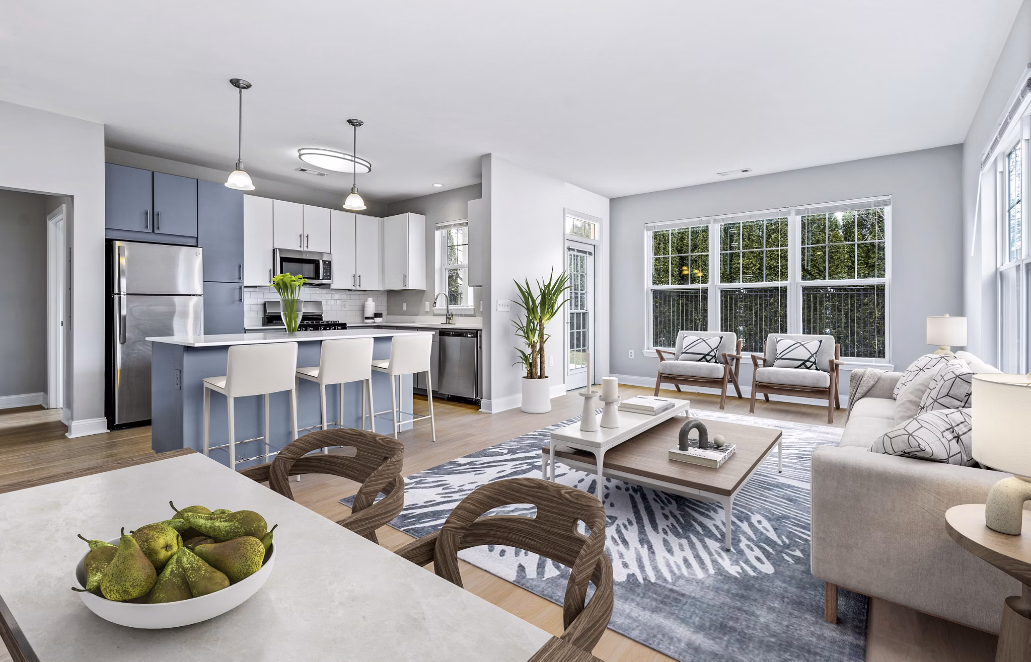 Dining area with elegant chandelier at The Preserve at Cohasset Apartments
