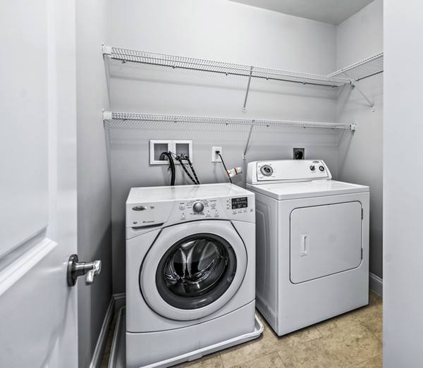laundry room at The Preserve at Cohasset Apartments