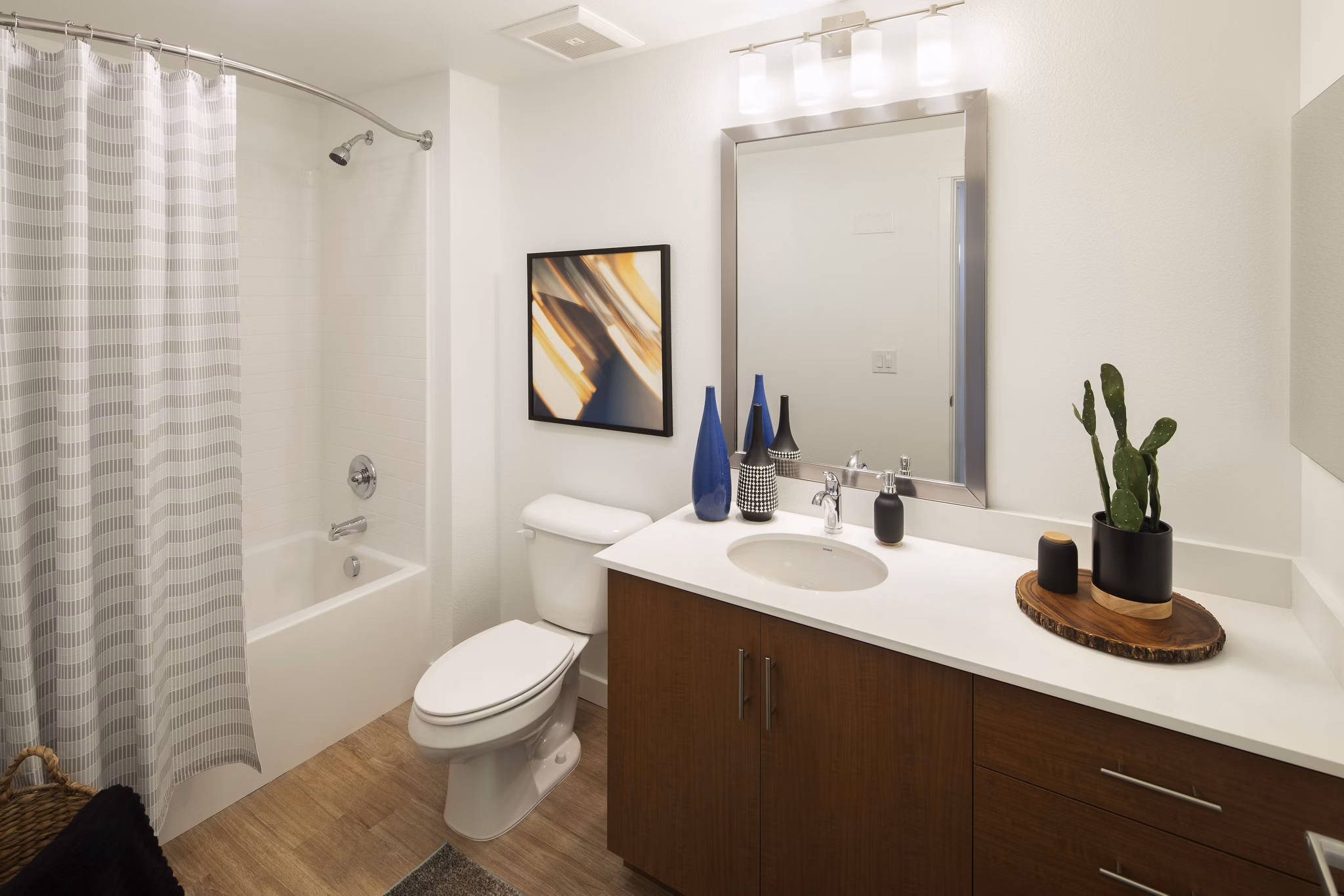 Modern bathroom with sleek fixtures and marble countertops at The Well Apartments, offering luxury living in the heart of a vibrant community