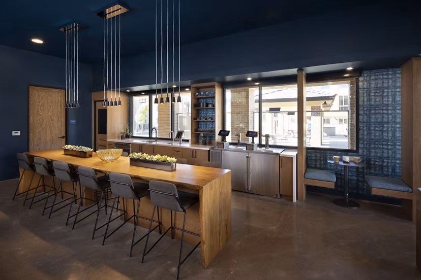 Modern clubhouse with gaming lounge and community space at The Well Apartments, a luxury living destination by Greystar