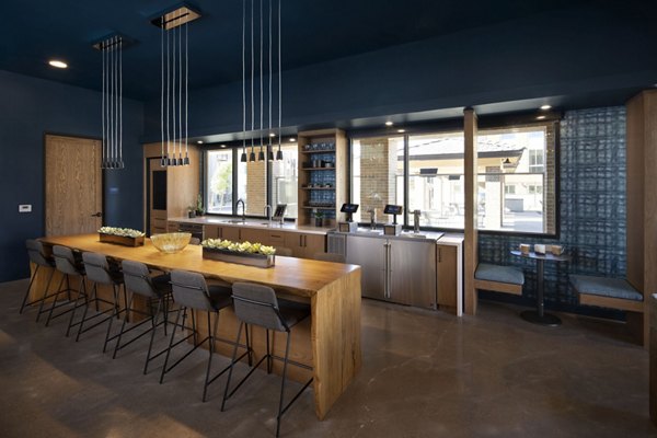 Modern clubhouse with gaming lounge and community space at The Well Apartments, a luxury living destination by Greystar