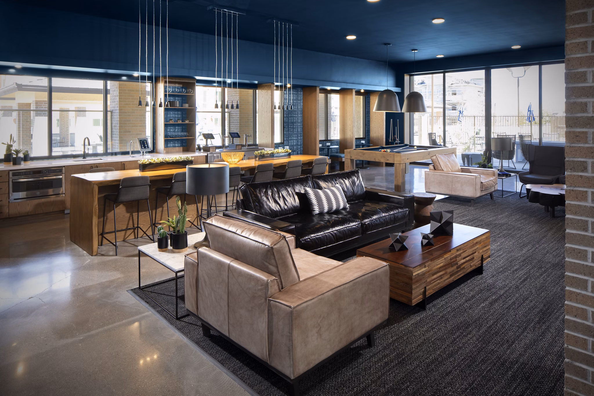 Clubhouse featuring modern design elements at The Well Apartments