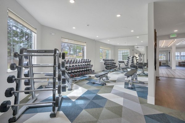 The Marks Apartments: Modern fitness center with advanced equipment for luxury living