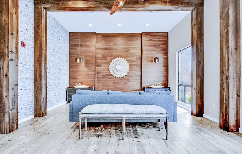 Stylish clubhouse with modern seating and decor at HUE97 Apartments