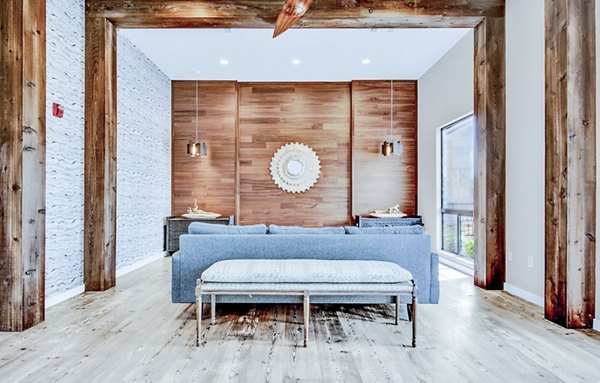 Stylish clubhouse with modern seating and decor at HUE97 Apartments