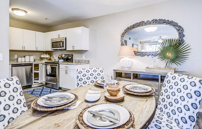 Dining room featuring elegant lighting and modern furniture at HUE97 Apartments