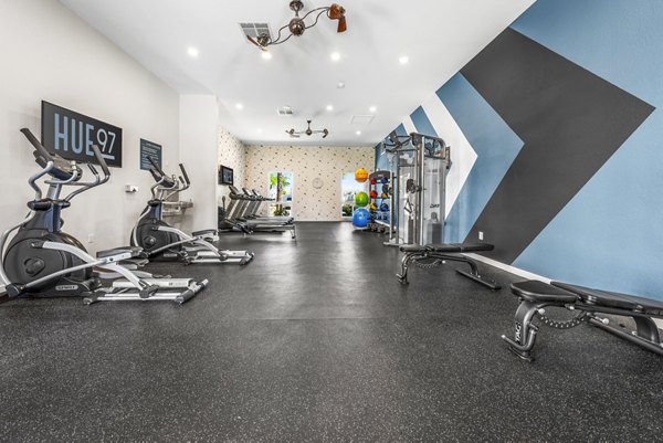 fitness center at HUE97 Apartments